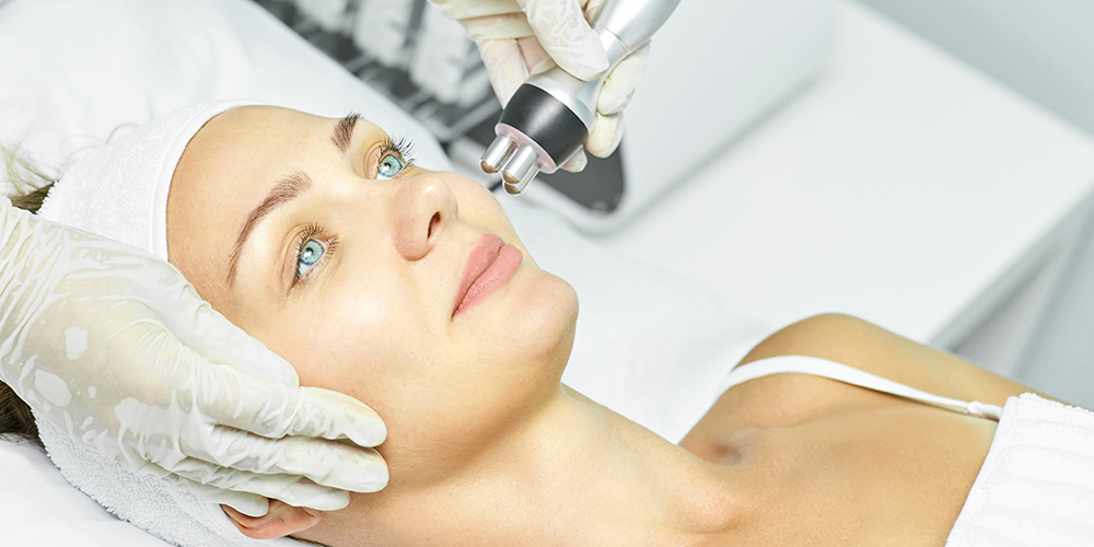 a woman undergoing a laser treatment