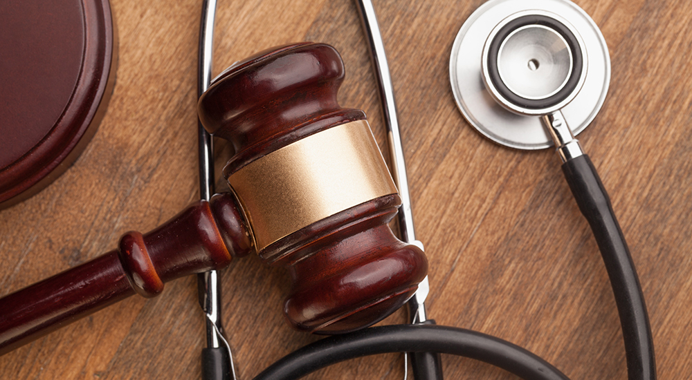 a gavel and a stethoscope